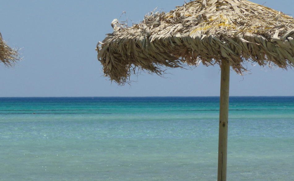Thatched umbrella on the shore of Elafonissi beach