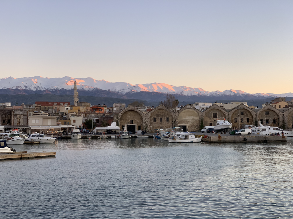 View of White Mountains from Chania Harbour in March on Crete