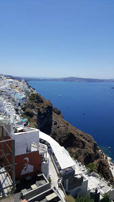 Views from Fira to volcanic island